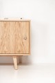 Minimalistic sideboard with sliding doors - simplicity and functionality in one